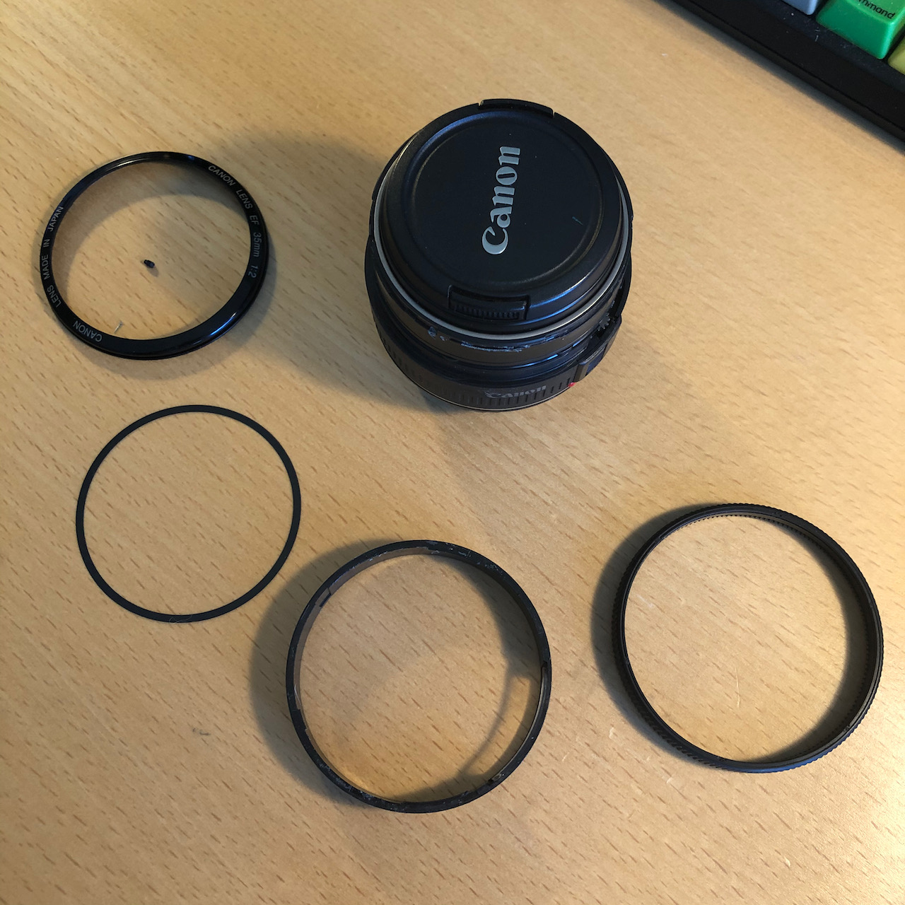 Parts removed to access focus ring, in order.